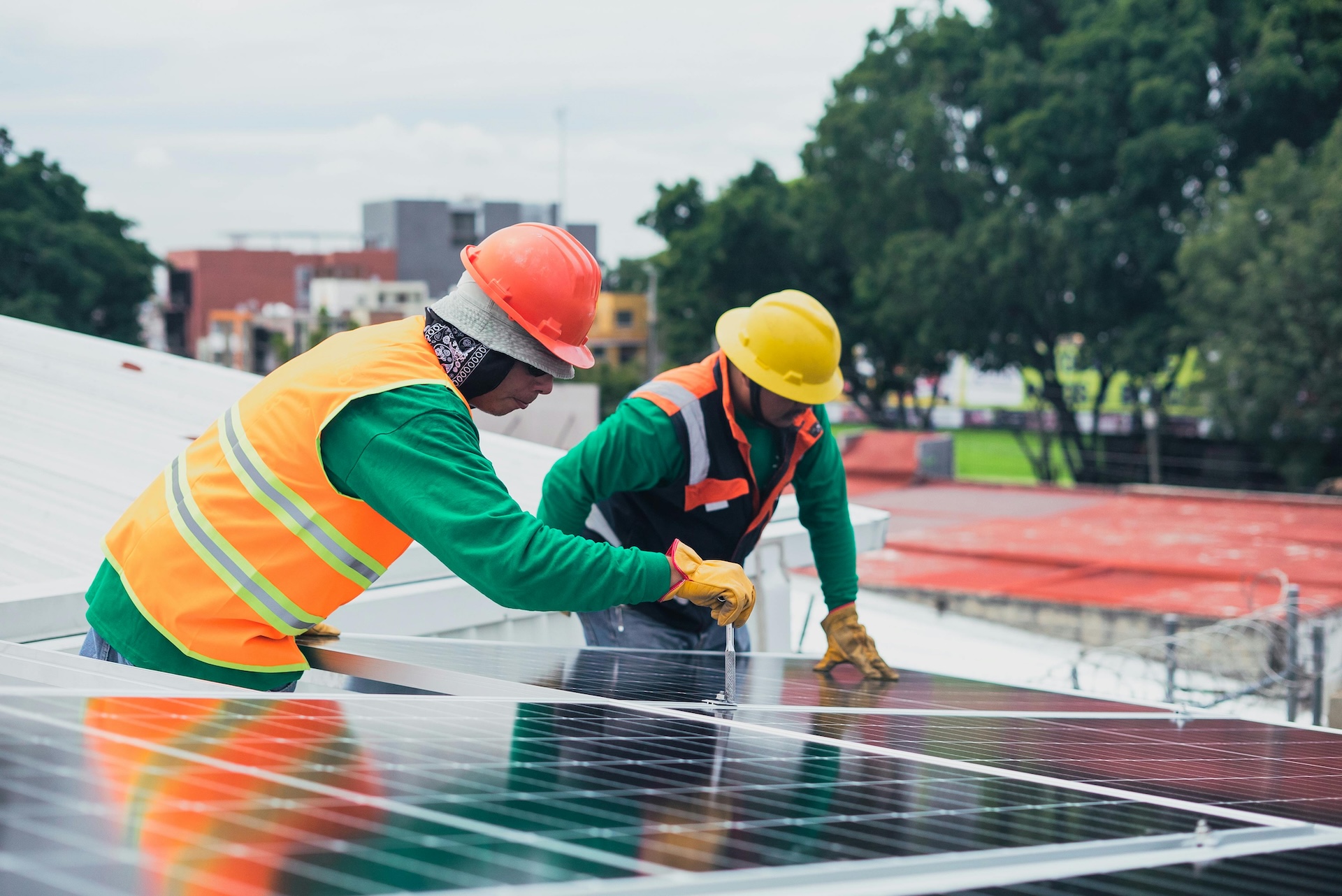 builders installing solar panels because of construction loan