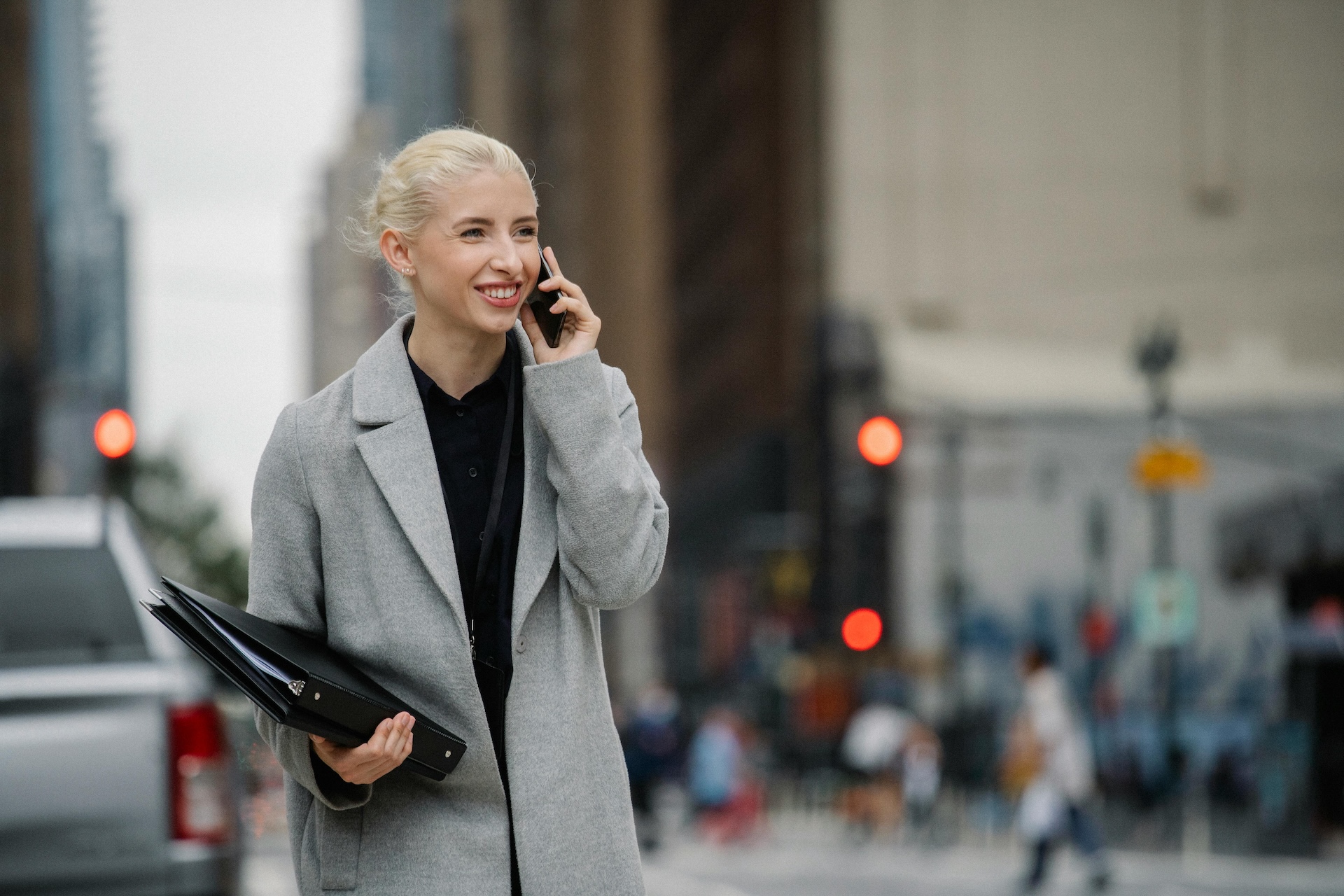 woman on phone call smiling